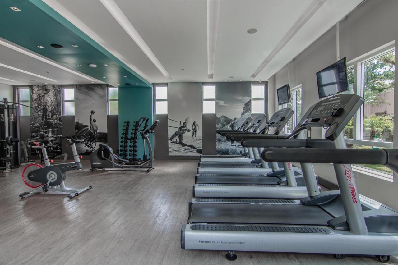 Hotel Deville Prime Porto Alegre Exterior photo The gym at the Village at Riverwalk