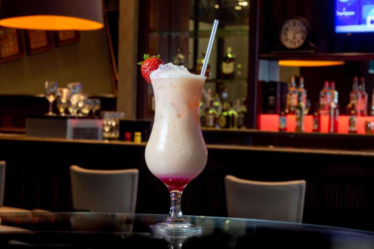 Hotel Deville Prime Porto Alegre Exterior photo A strawberry daiquiri